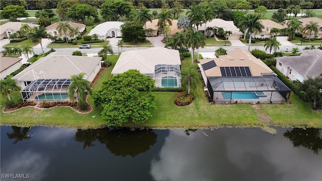 aerial view featuring a water view and a residential view