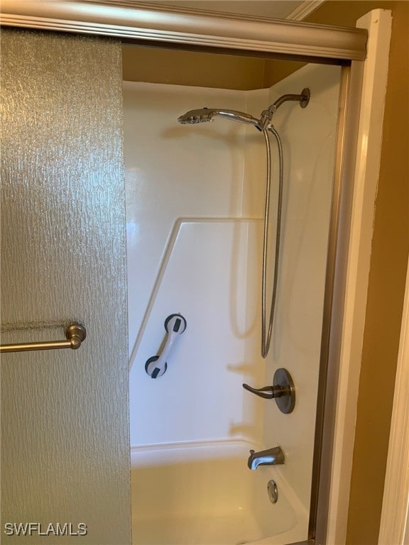 bathroom with shower / bathtub combination