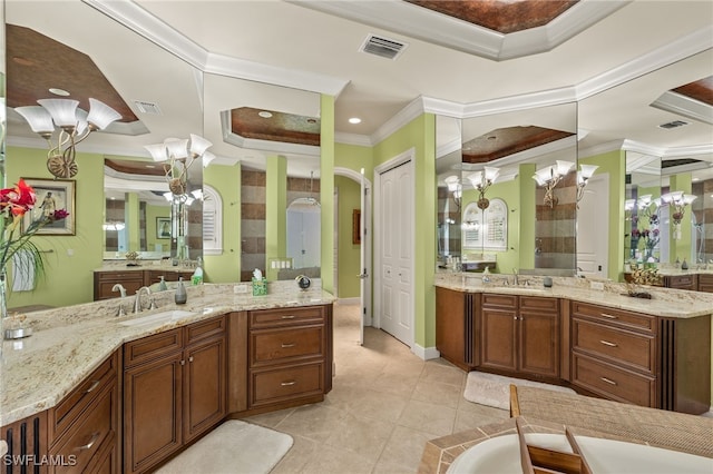 bathroom featuring a shower, vanity, tile patterned floors, and crown molding