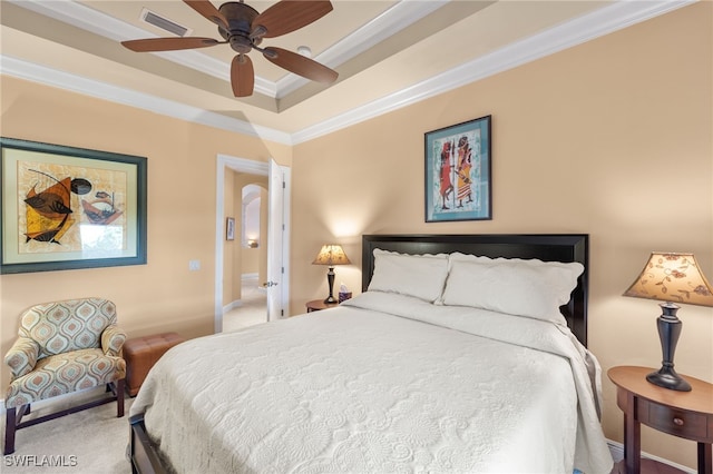 bedroom with carpet, ceiling fan, and ornamental molding