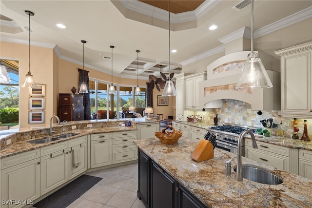 kitchen featuring sink, pendant lighting, and plenty of natural light