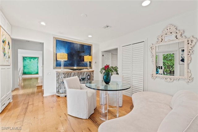 dining space with light hardwood / wood-style flooring