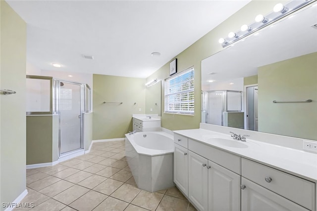 bathroom featuring separate shower and tub, tile patterned floors, and vanity