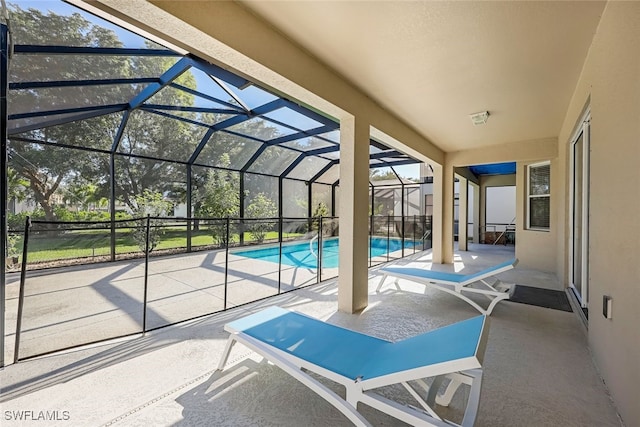 view of patio / terrace featuring a lanai