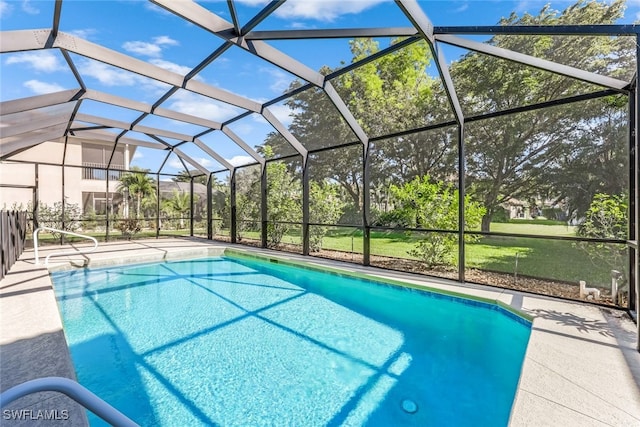 view of pool with a lanai