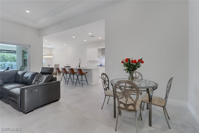 dining space featuring sink