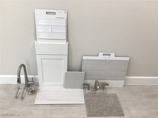 bathroom with tile patterned flooring