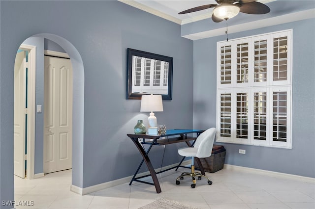 office space with ceiling fan, light tile patterned flooring, and ornamental molding