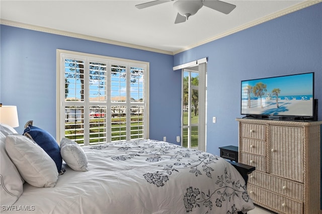 bedroom with ceiling fan and ornamental molding