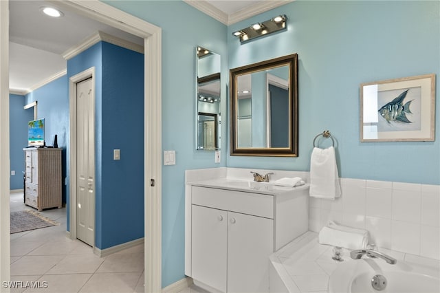 255 Cays Dr Unit 2001, Naples, FL 34114 - full bath featuring crown molding, vanity, a garden tub, and tile patterned flooring