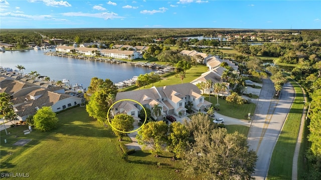 bird's eye view with a water view