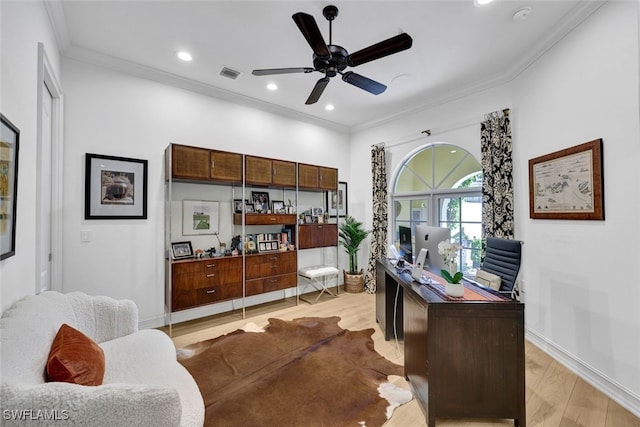 office space with ceiling fan, light hardwood / wood-style flooring, and ornamental molding