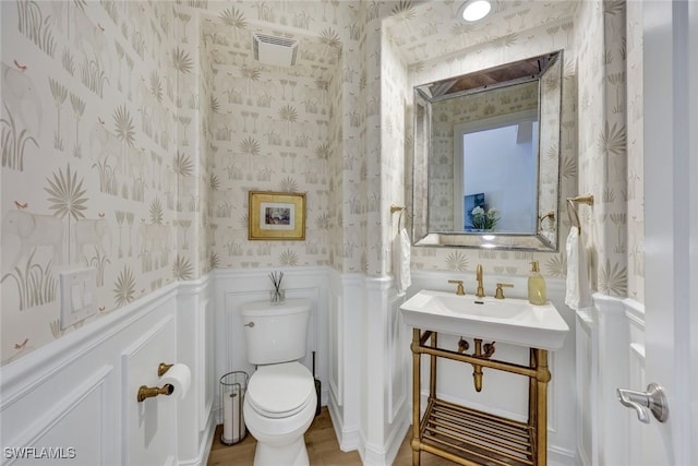 bathroom featuring toilet