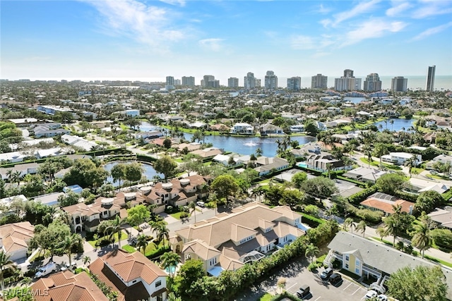 drone / aerial view with a water view