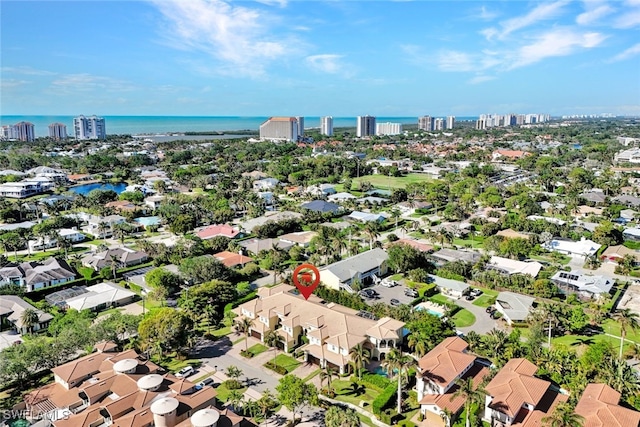 drone / aerial view with a water view