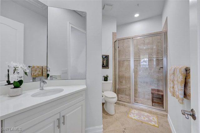 bathroom featuring toilet, vanity, tile patterned floors, and walk in shower