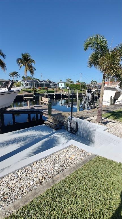 dock area featuring a water view