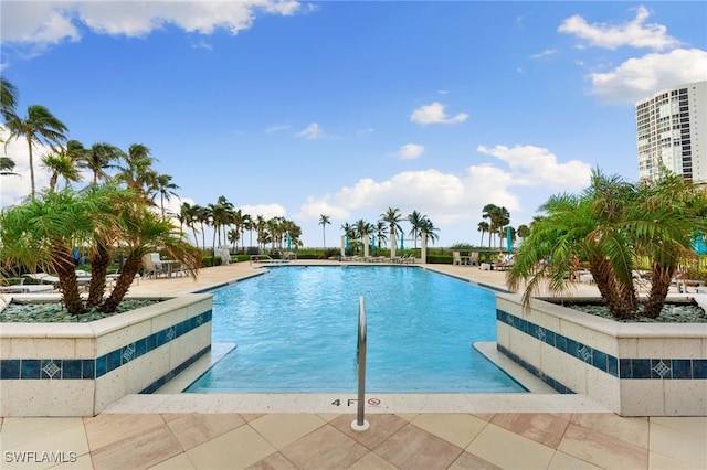 view of swimming pool featuring a patio