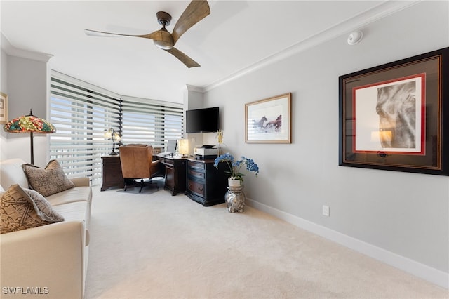 office space with light carpet, ceiling fan, and ornamental molding