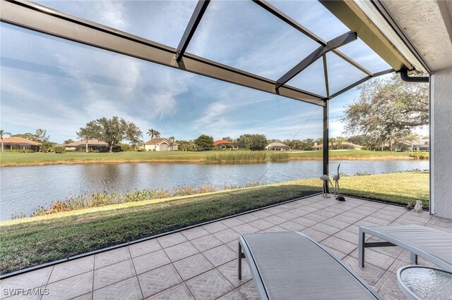 view of patio with a water view