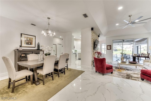 dining area featuring recessed lighting, baseboards, visible vents, and marble finish floor