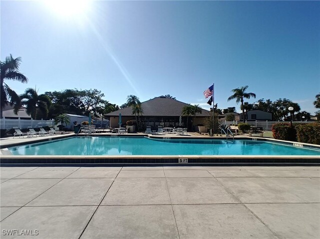 view of swimming pool featuring a patio