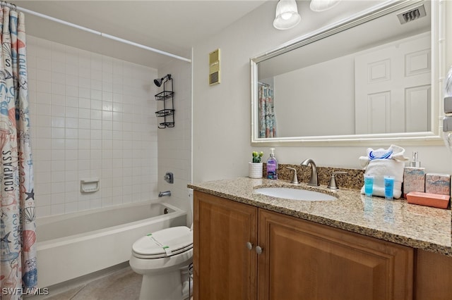 full bathroom featuring tile patterned floors, vanity, toilet, and shower / bathtub combination with curtain