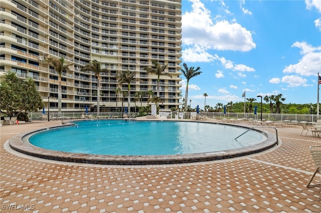 view of pool featuring a patio