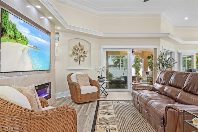 sunroom / solarium featuring a premium fireplace