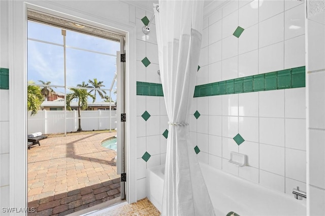 bathroom featuring shower / bath combination with curtain