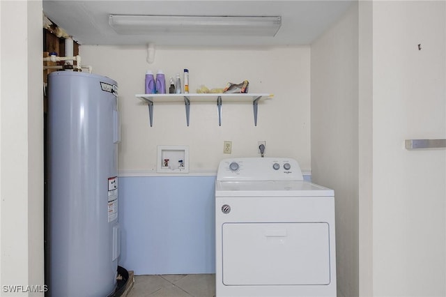 clothes washing area featuring hookup for a washing machine, light tile patterned floors, laundry area, and electric water heater