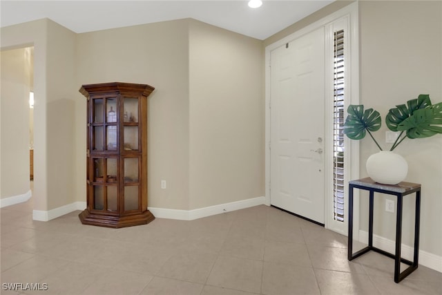 view of tiled foyer entrance