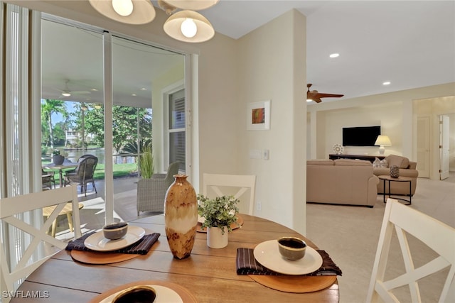 dining room featuring ceiling fan