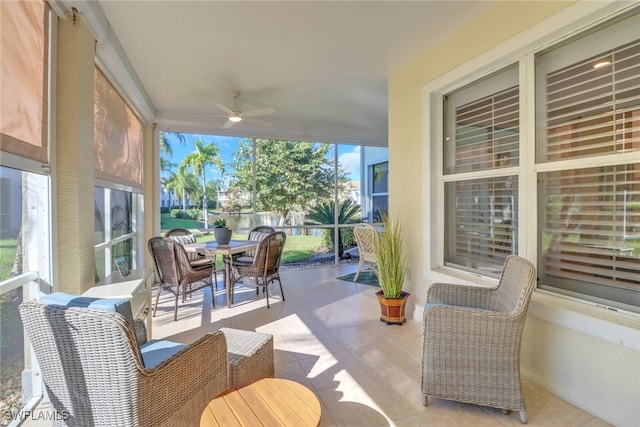 view of patio featuring ceiling fan