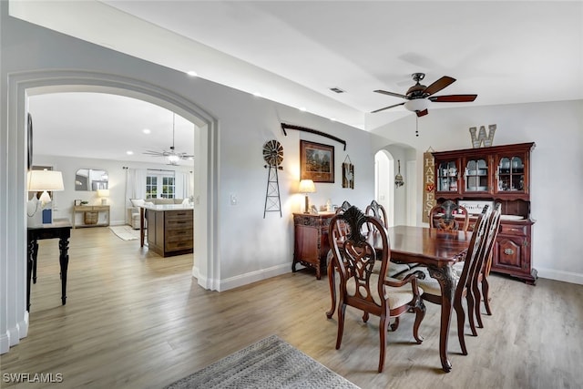 dining area with light hardwood / wood-style flooring