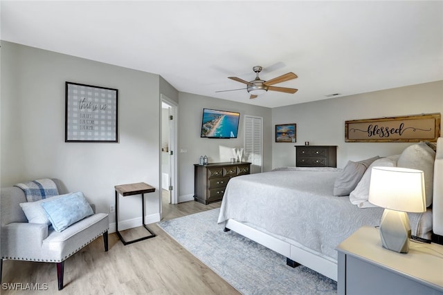 bedroom featuring ceiling fan and light hardwood / wood-style floors