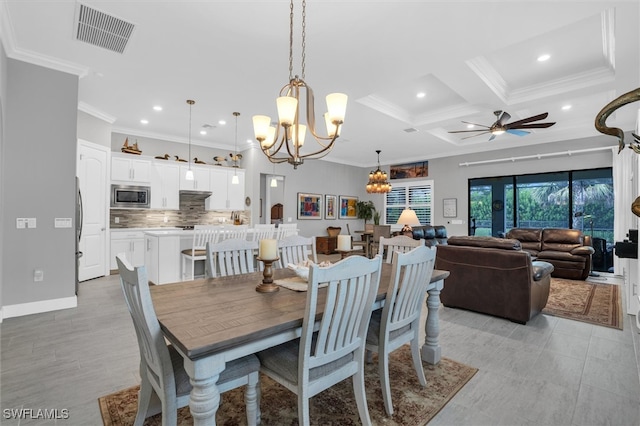 dining area with beam ceiling, coffered ceiling, ceiling fan with notable chandelier, and ornamental molding