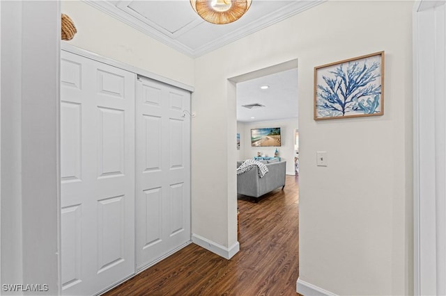 hall with crown molding and dark hardwood / wood-style floors