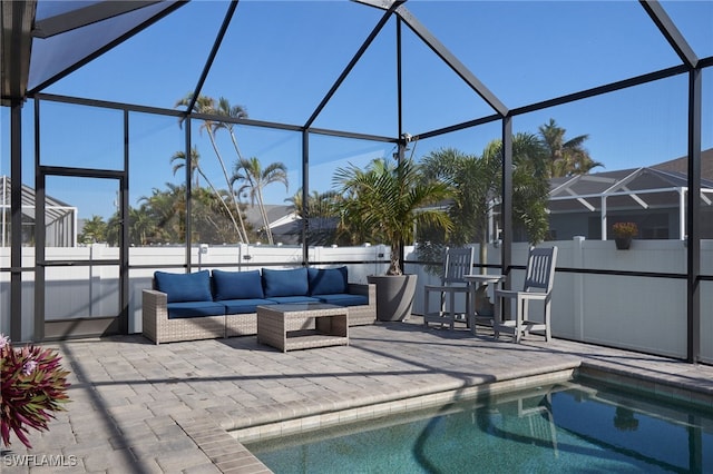 view of pool featuring a patio area, a lanai, and an outdoor hangout area