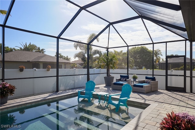 view of patio / terrace with a lanai