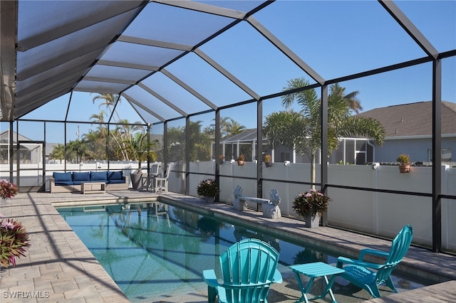 view of pool featuring a lanai and a patio area