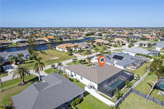 bird's eye view with a water view