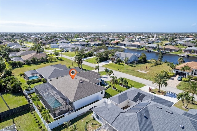 bird's eye view with a water view