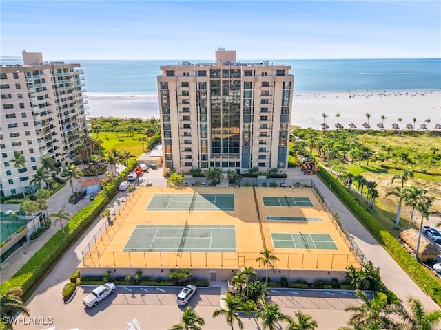 aerial view featuring a view of the beach and a water view