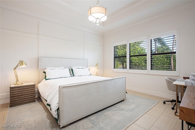 bedroom with ornamental molding