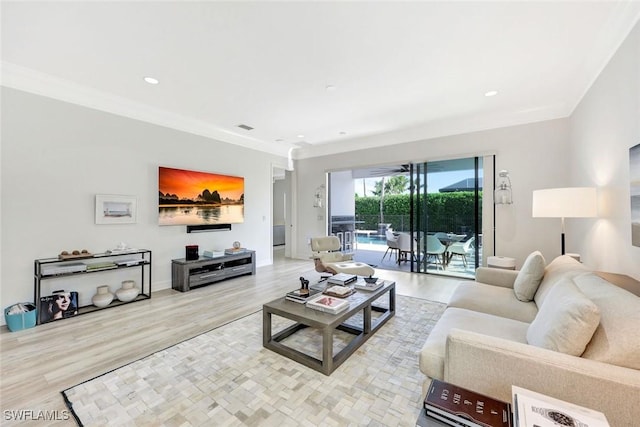 3565 Beaufort Ct, Naples, FL 34119 - living area with crown molding, light wood-style flooring, recessed lighting, and baseboards