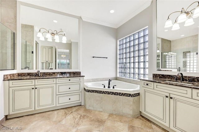 3565 Beaufort Ct, Naples, FL 34119 - bathroom with a shower stall, crown molding, a garden tub, two vanities, and recessed lighting