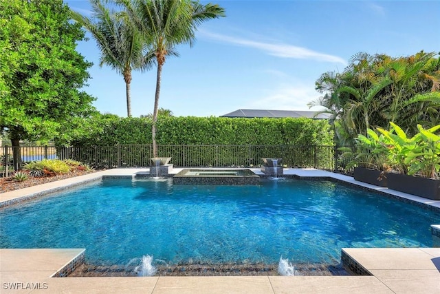 3565 Beaufort Ct, Naples, FL 34119 - view of pool with fence and a pool with connected hot tub