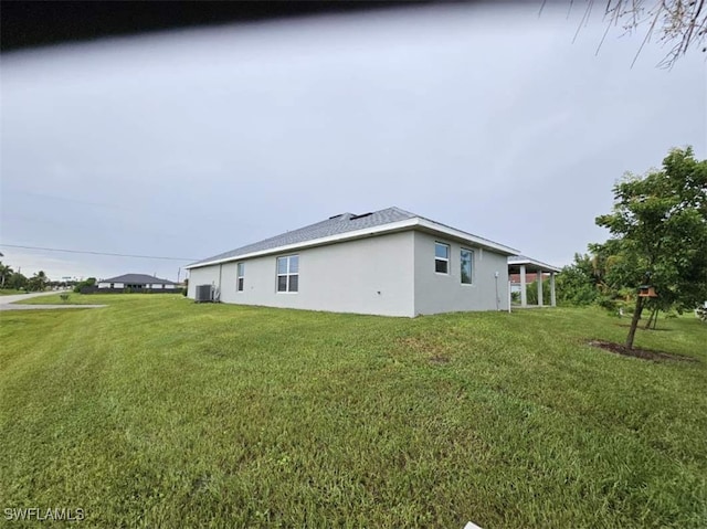 view of home's exterior featuring a yard