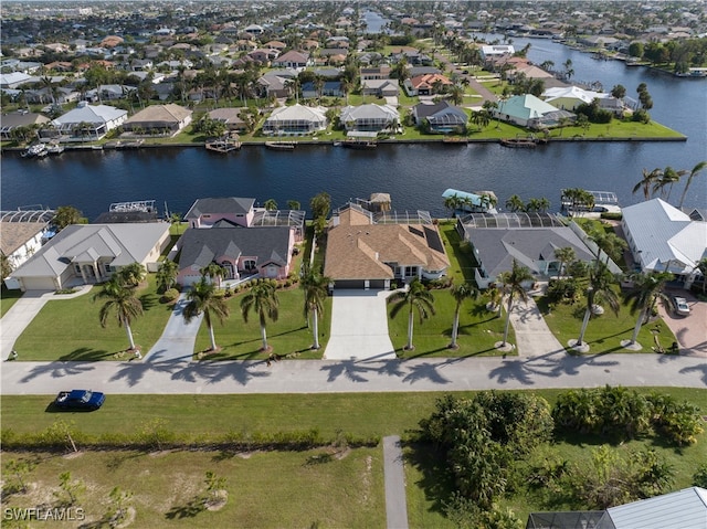 drone / aerial view with a water view